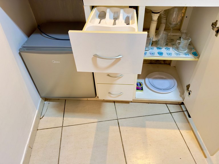 Estúdio triplo c/ ar no centro de Divinópolis 102